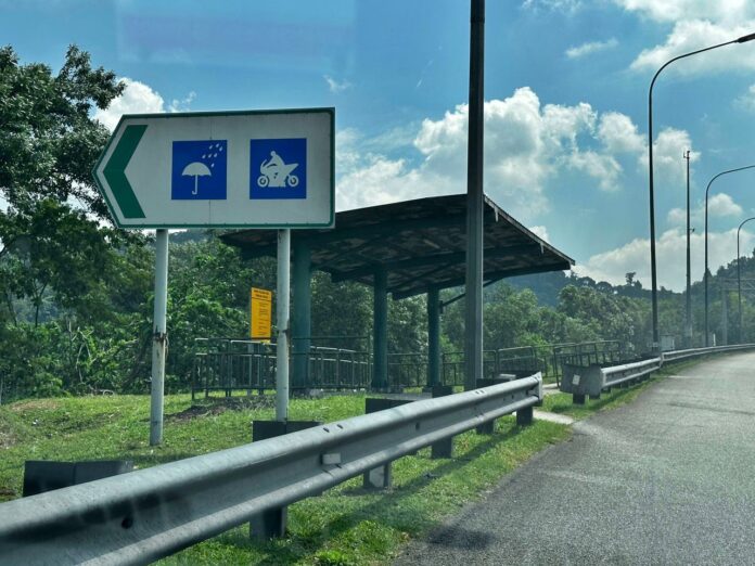 PLUS motorcvcle shelter on highway