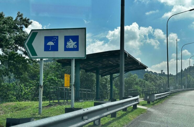 PLUS motorcvcle shelter on highway